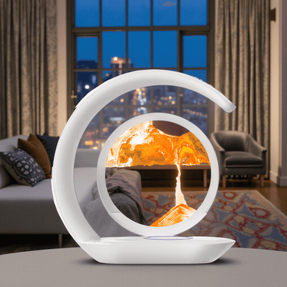 Modern decorative lamp with flame effect on a table in a living room setting.