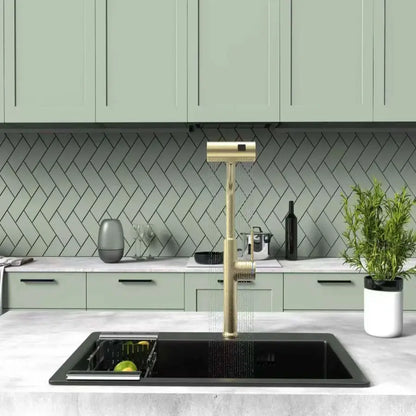 Modern kitchen with a gold faucet and green cabinets
