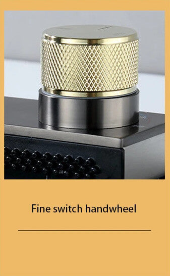Gold and black fine switch handwheel on a gray background